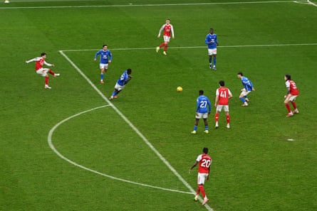 Martín Zubimendi (left) fires home the opening goal at the Emirates