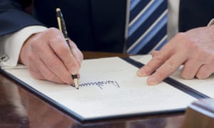 US President Donald Trump signs an executive order related to to crime after Jeff Sessions was sworn in as Attorney General, 9 February, 2017.