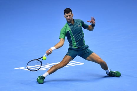 Djokovic plays a forehand.