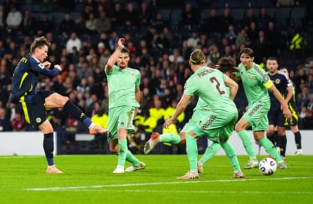 Scott McTominay (left) doubles Scotland’s lead over Belarus, but they were still made to endure a tense finale.