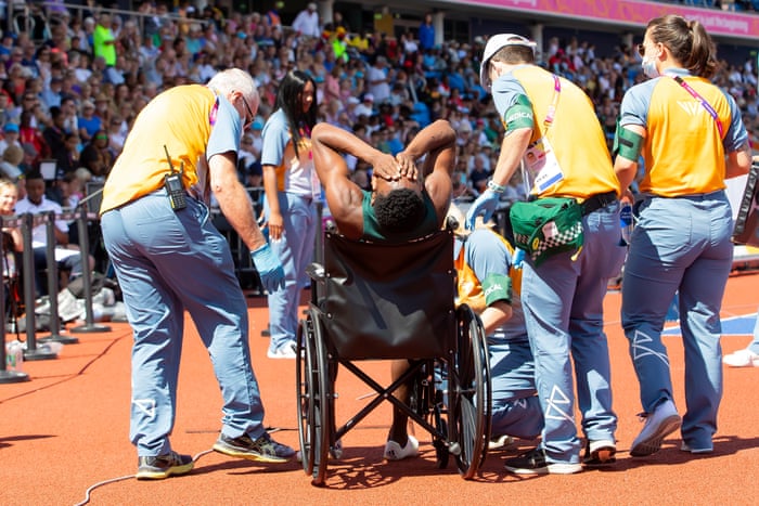 Samukonga is distraught as he exits in a wheelchair.