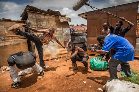 Isaac Nabwana shoots a fight scene adjusted by Ivan stuntman, Martial Art teacher and member of the Ugandan Kung Fu national team, Charles Bukenya and Henry the « Barbarian ».