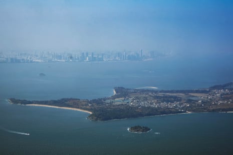 A view of the South China Sea between the city of Xiamen in China, in the far distance, and the islands of Kinmen in Taiwan, in the foreground.