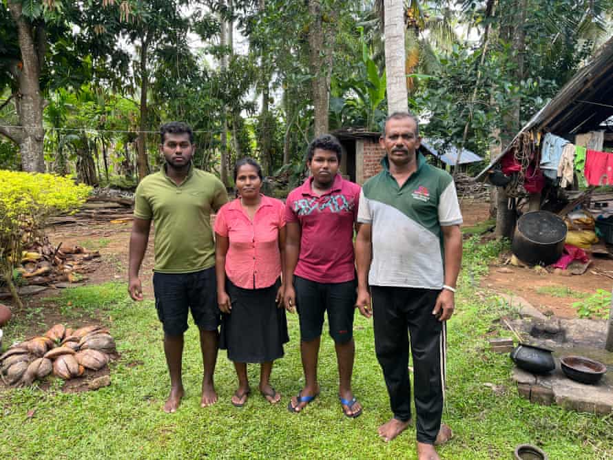 Rice paddy and banana farmer Piyasiri Atalugama and his family