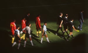 Argentina’s captain Diego Maradona leads his team out.