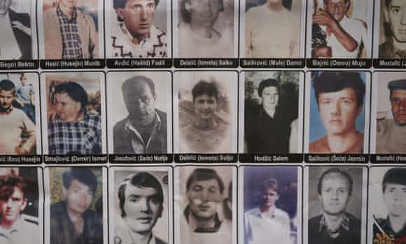 Bosnian Muslim victims on a banner at The Hague