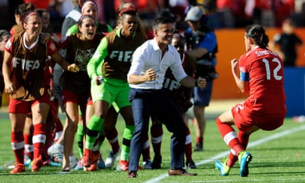 John Herdman celebrates with his players at the 2015 Women’s World Cup in Canada