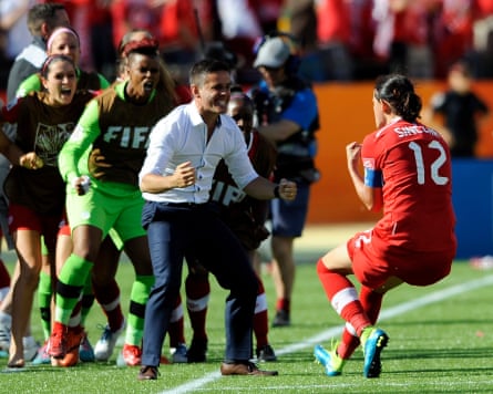 John Herdman (centre) celebrates pinch Canada’s Christine Sinclair aft nan latter’s winning extremity against China astatine nan 2015 Women’s World Cup.