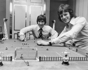 Martin Buchan (left) of Manchester United and Mick Channon of Southampton engage in a game of Subbuteo before facing each other in the upcoming 1976 FA Cup final.