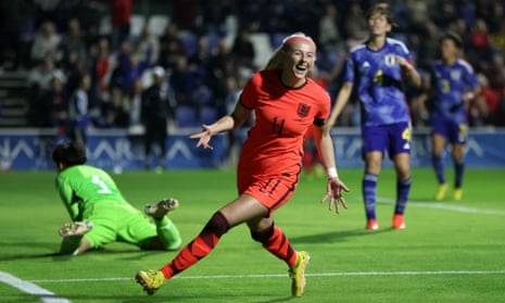 Chloe Kelly of England celebrates scoring her team's second goal.