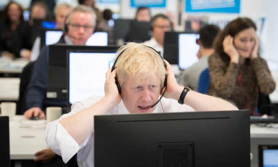 Boris Johnson takes calls at Conservative party campaign headquarters