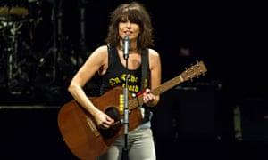 Chrissie Hynde in concert in 2015, wearing jeans, when she was 63.