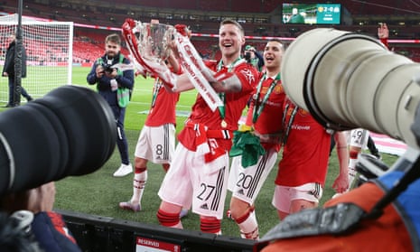 Wout Weghorst celebrates with the Carabao Cup after Manchester United’s victory over Newcastle.