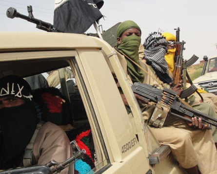 Armed fighter in a truck