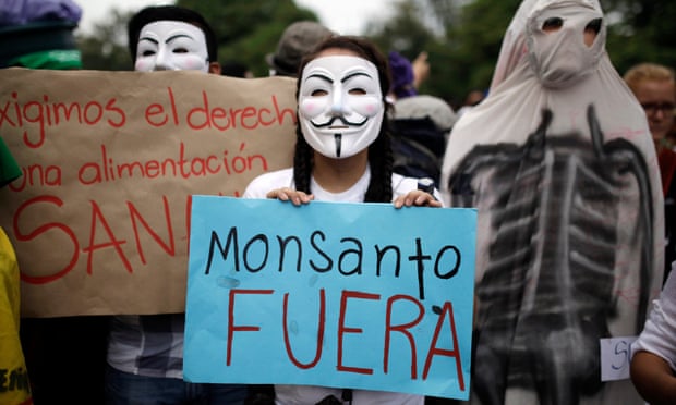Activists in San Salvador march to commemorate World Food Day in October 2014