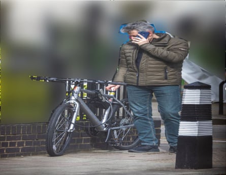 Howard Phillips placing a USB into a bike seat shaft
