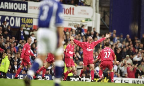 Gary McAllister celebrates with Gregory Vignal and other Liverpool team-mates after scoring a stoppage-time winner against Everton at Goodison Park in April 2001