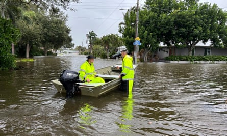 Rescue crews assist residents after conducting door-to-door wellness checks in coastal areas that were flooded by Hurricane Helene on Friday, 27 September 2024.