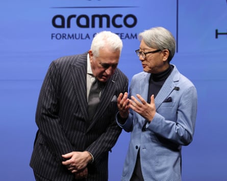 Honda’s Toshihiro Mibe (right) shares his thoughts with Aston Martin’s Lawrence Stroll at the Japanese manufacturer’s F1 launch in Tokyo
