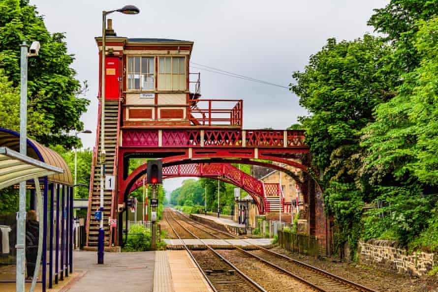 Grade 2 listed footbridge with elevated signalbox at Wylam station, one of the oldest functioning stations in the world.