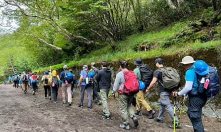 A line of hikers on Mount Fuji.