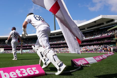 Joe Root and Harry Brook walk out to bat on day two.