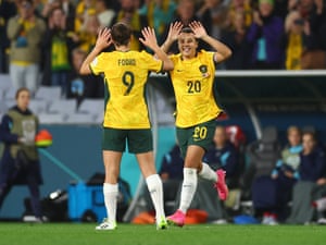 Australia’s Sam Kerr high fives Caitlin Foord after coming on as a substitute in the second half.