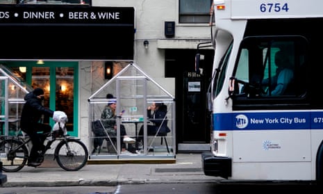Covid live: Italy and Spain to ease mask mandate; UK records 66,183 new cases – as it happened 4 People eat lunch in an outdoor dining shed in midtown New York City in January 2021.