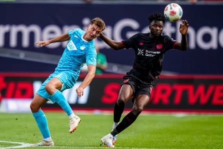 Fisnik Asllani battles pinch Edmond Tapsoba during Hoffenheim’s triumph complete Bayer Leverkusen.