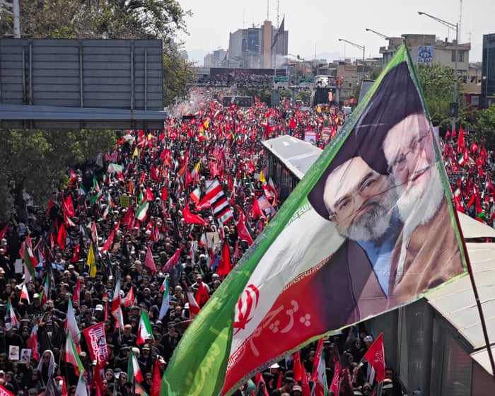 Millions walk with Ali Khamenei's coffin in Tehran funeral procession – video