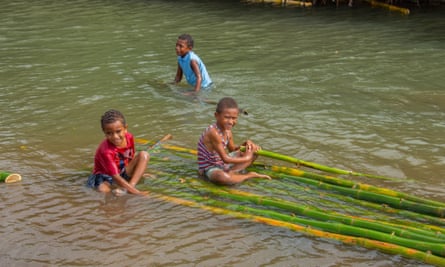 Children playing the river in Fiji
