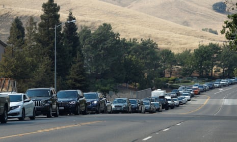 Cars line up as people try to evacuate Fairfield 50 miles east of San Francisco on Wednesday.