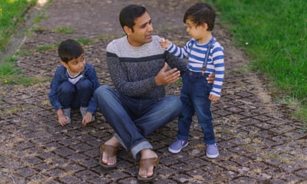 Owais Raja, with his sons, Aayan, six, and Aazan, two, in May.
