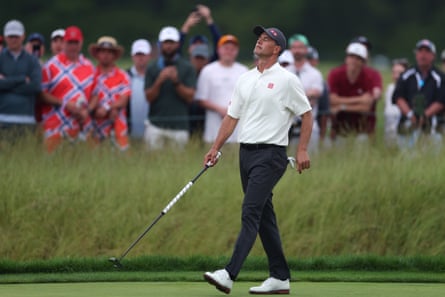 Adam Scott reacts to a missed putt at the US Open
