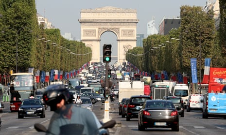 Traffic on the Avenue des Champs Elysees in Paris, France