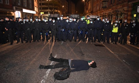A man lies in the road during the ‘kill the bill’ protest in Bristol