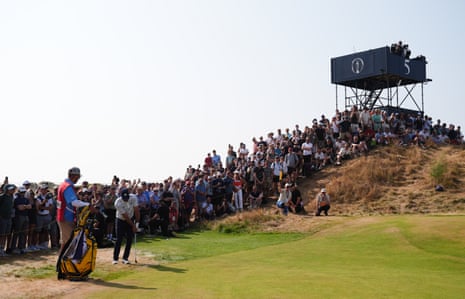 Bryson DeChambeau chips to the pin on the 5th.