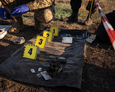 Recovered items are photographed and recorded to help with identification.