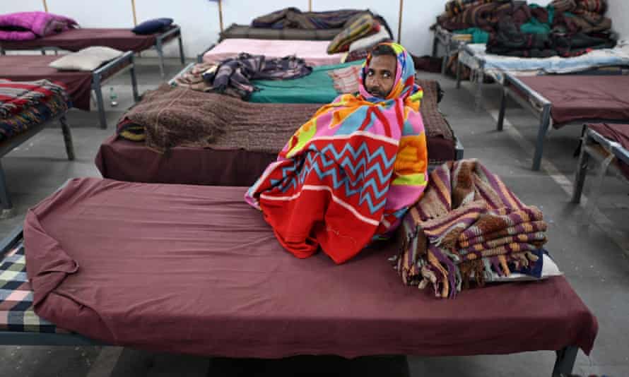 A man in a government-run homeless shelter in New Delhi amid the winter chill