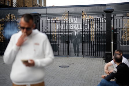 The old gates to the main entrance at White Hart Lane, with a picture of venerated manager Bill Nicholson behind them.