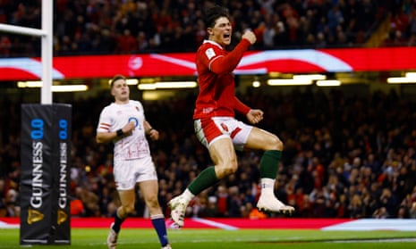 Wales' Louis Rees-Zammit celebrates scoring their first try