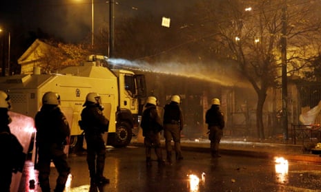 Athens police using a water cannon following a rally for the 45th anniversary of a 1973 student uprising