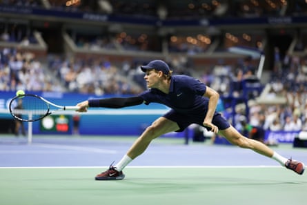 Jannik Sinner returns a changeable against Lorenzo Musetti during Wednesday night’s US Open quarter-final match.