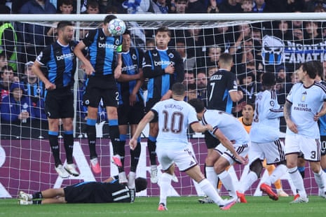 Aston Villa's Emiliano Buendia makes an attempt to score on a free kick but hits the wall.