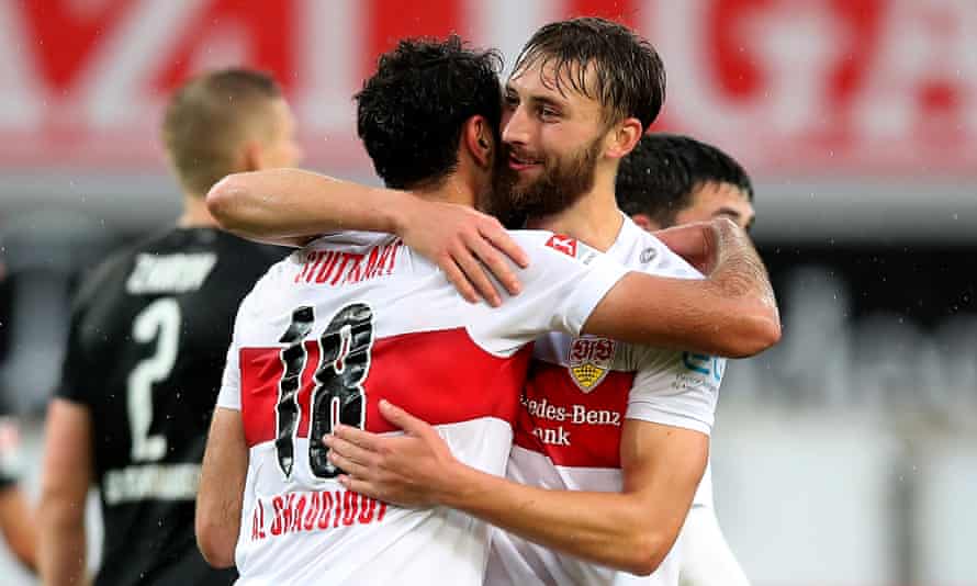 Nat Phillips congratulates the goalscorer Hamadi Al Ghaddioui during Stuttgart’s 5-1 win against Sandhausen in June 2020.