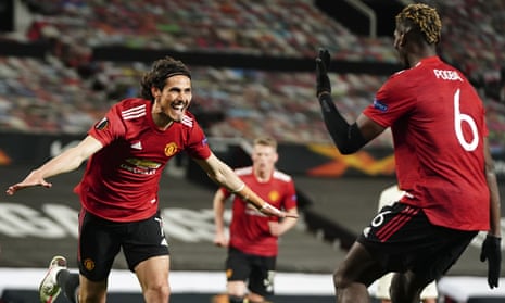 Edinson Cavani (left) celebrates after scoring his second, and Manchester United’s third goal of the game. 