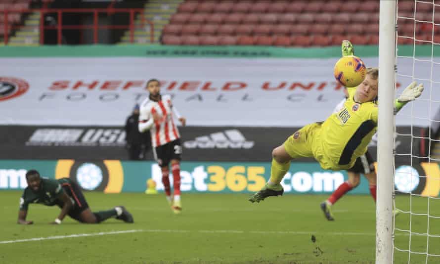 Ndombele watches his lob drift over Aaron Ramsdale.