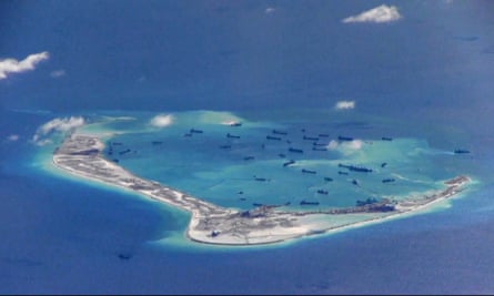 An image from United States Navy video purportedly shows Chinese dredging vessels in the waters around Mischief Reef in the disputed Spratly Islands.