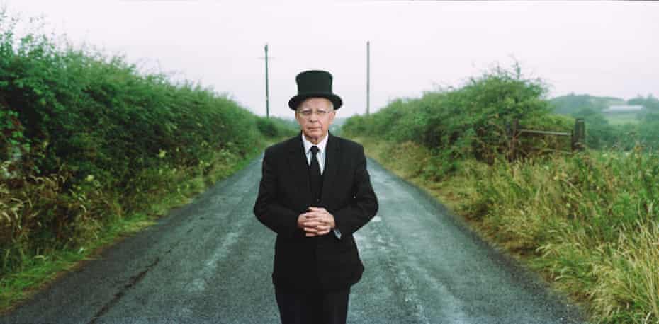 Johnny McKeegan, an undertaker, stands near the border between County Fermanagh and County Cavan in Enniskillen, Northern Ireland