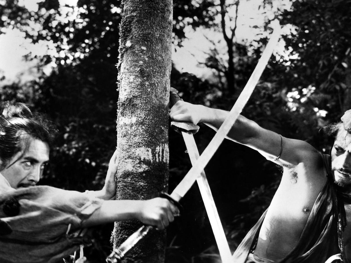 Rashomon: The Film That Changed The Meaning of Truth 2 Tajōmaru and samurai Takehiro fighting with swords in the forest in Rashomon